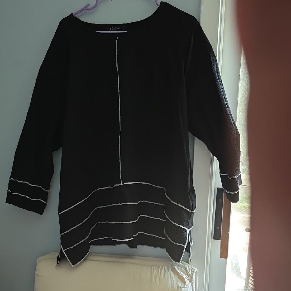 Chic Black Top with White Accents